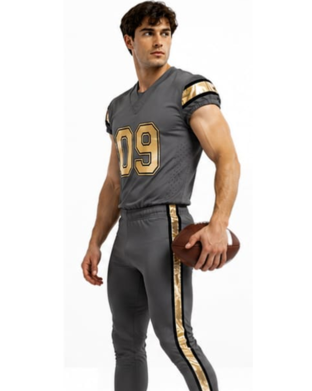A man modeling a dark gray football uniform with gold accents, featuring the number 09 on the chest and a gold stripe down the side, holding a brown football against a white background.