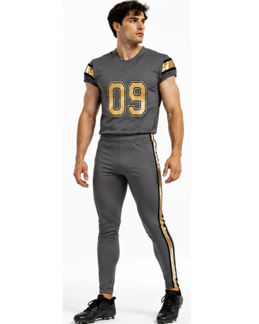 A man modeling a dark gray football uniform set with gold accents, featuring the number 09 on the chest and a gold stripe down the side of the pants, set against a plain white background.