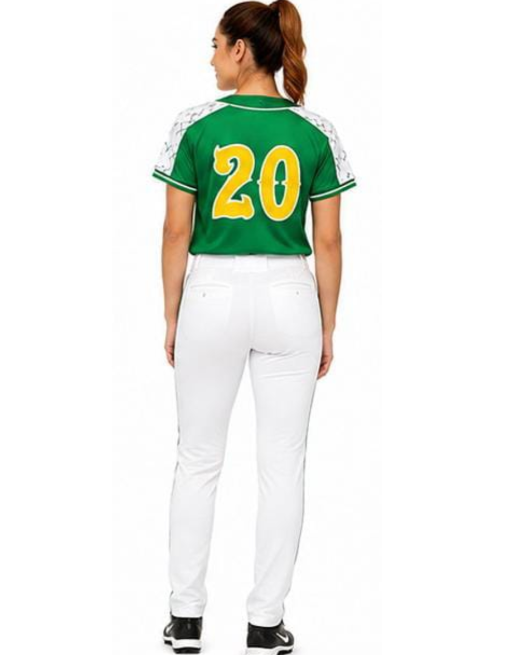 A woman shown from the back wearing a green short-sleeve athletic jersey with white shoulder panels, a large yellow number 20 on the back, and white pants against a plain white background.