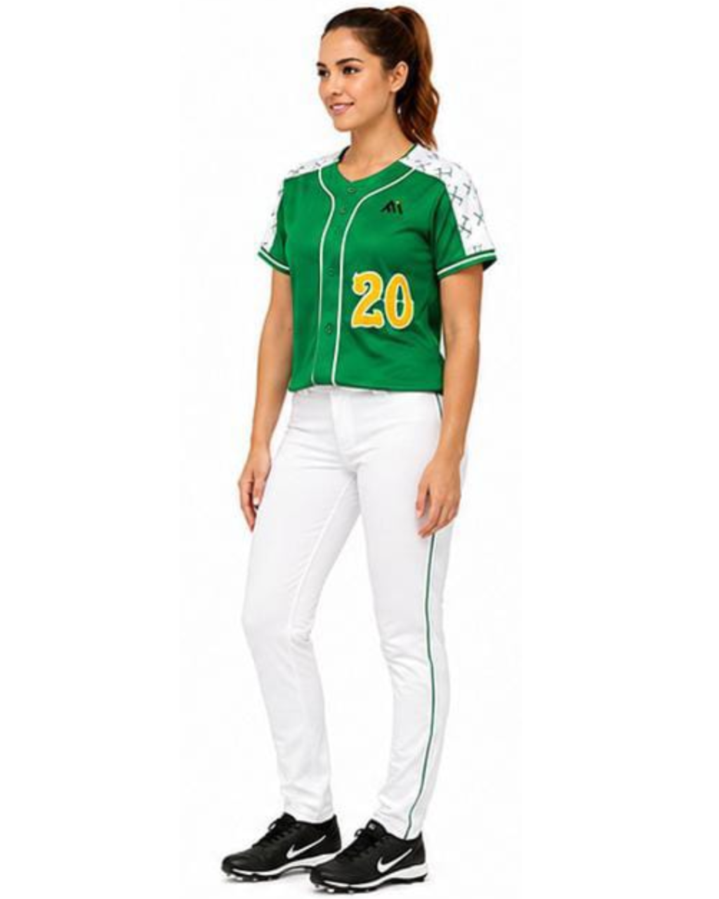 A woman modeling a green and white baseball-style jersey with yellow number 20 on the front, paired with white pants and black Nike sneakers, against a plain white background.