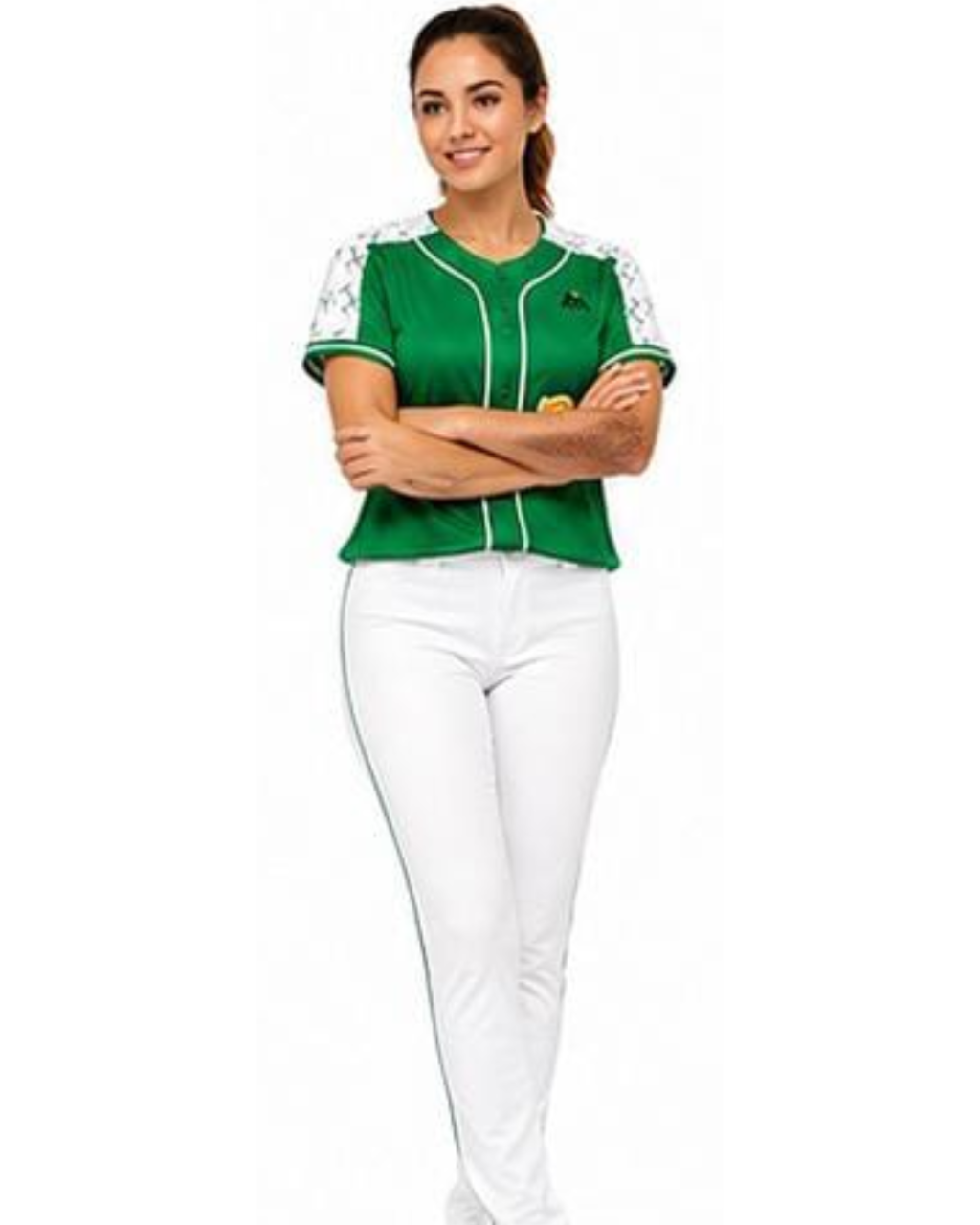 A woman modeling a green and white baseball-style jersey with white pants, standing against a plain white background with her arms crossed.