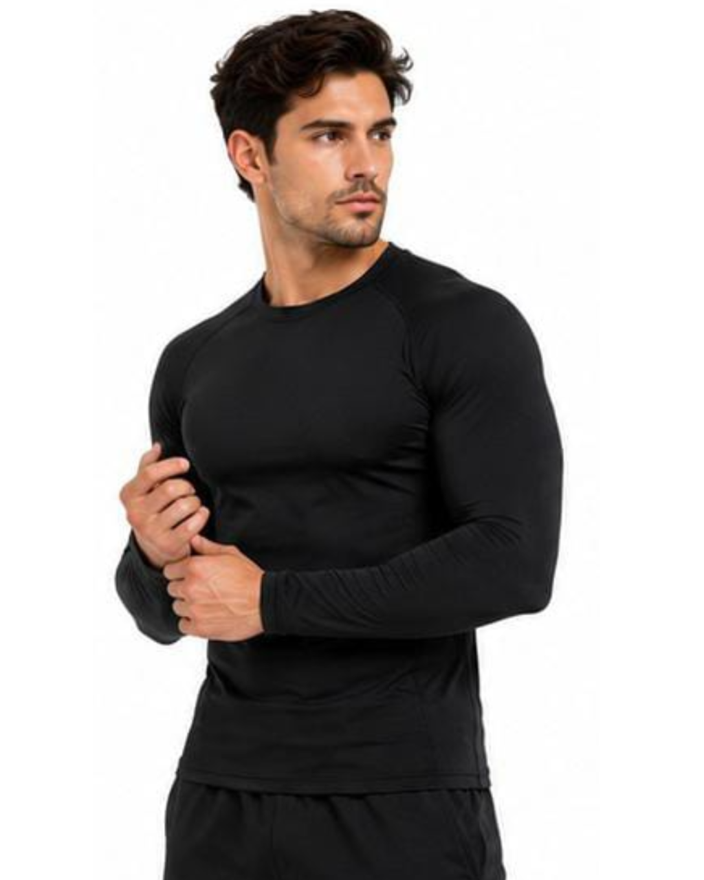 A man wearing a tight-fitting black long-sleeve athletic shirt, shown from the waist up against a plain white background.