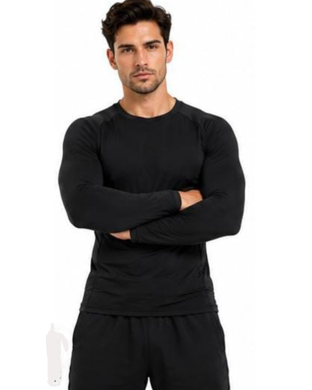 A man wearing a black long-sleeve crewneck athletic shirt and black shorts, standing with arms crossed against a plain white background.