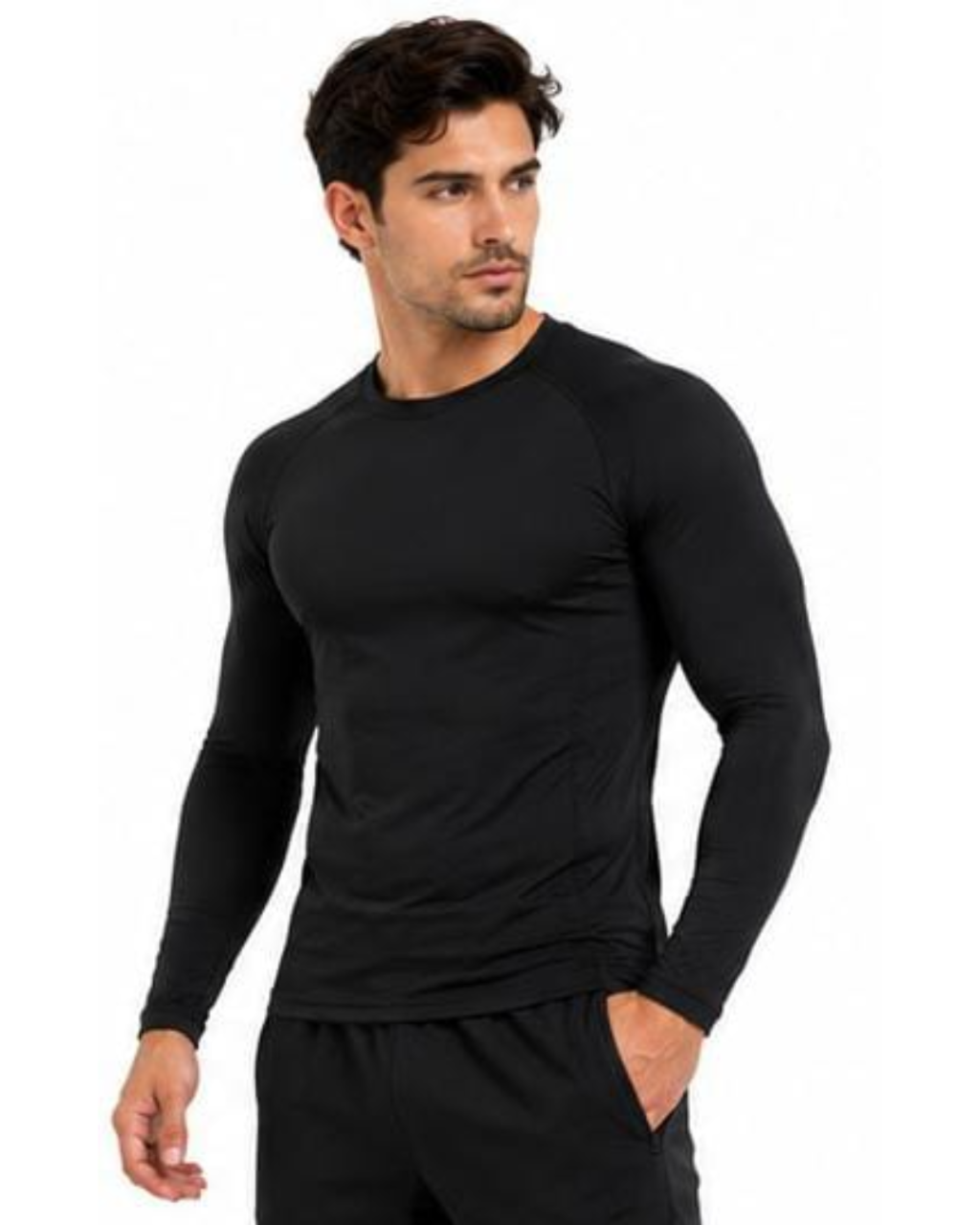 A muscular man wearing a tight-fitting black long-sleeve athletic shirt and black pants, standing against a plain white background.