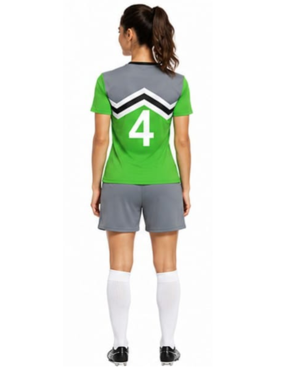 A woman shown from the back wearing a green and gray athletic soccer jersey with the number 4 on the back, gray shorts, white knee-high socks, and black cleats, against a plain white background.