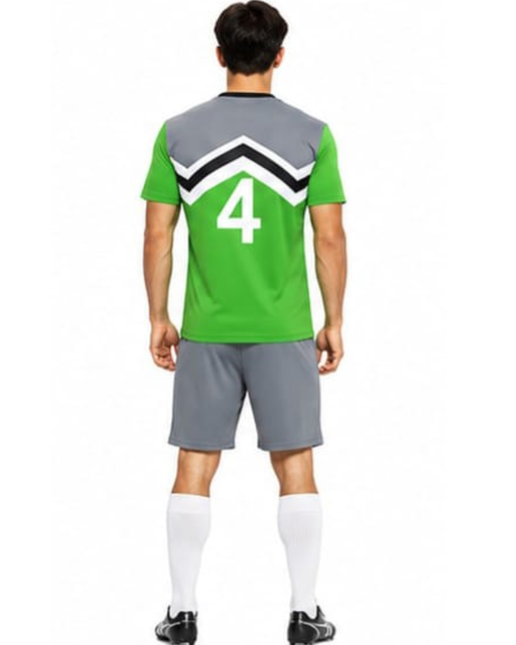 A man viewed from the back wearing a green and gray soccer jersey with a white and black chevron pattern and the number 4 on the back, paired with gray shorts, white socks, and black cleats against a white background.