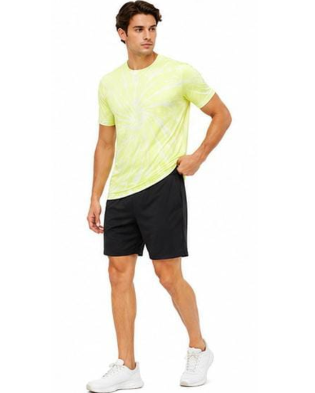 A man modeling a short-sleeve athletic t-shirt in neon yellow-green with a subtle spiral pattern, paired with black athletic shorts and white sneakers, against a plain white background.