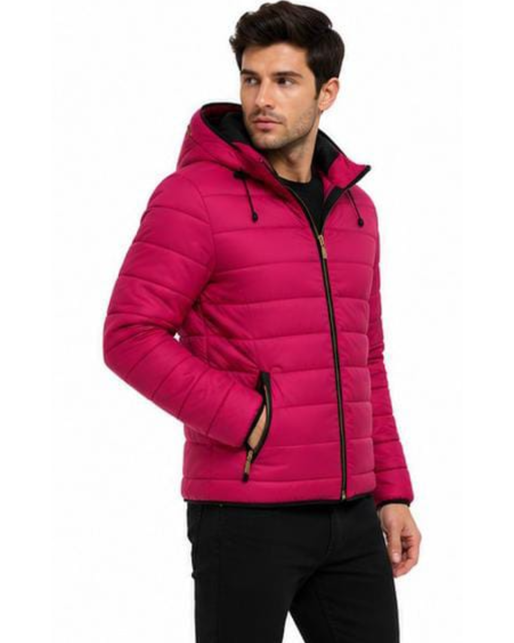 A man wearing a bright pink hooded puffer jacket with black trim and black pants, photographed against a plain white background.