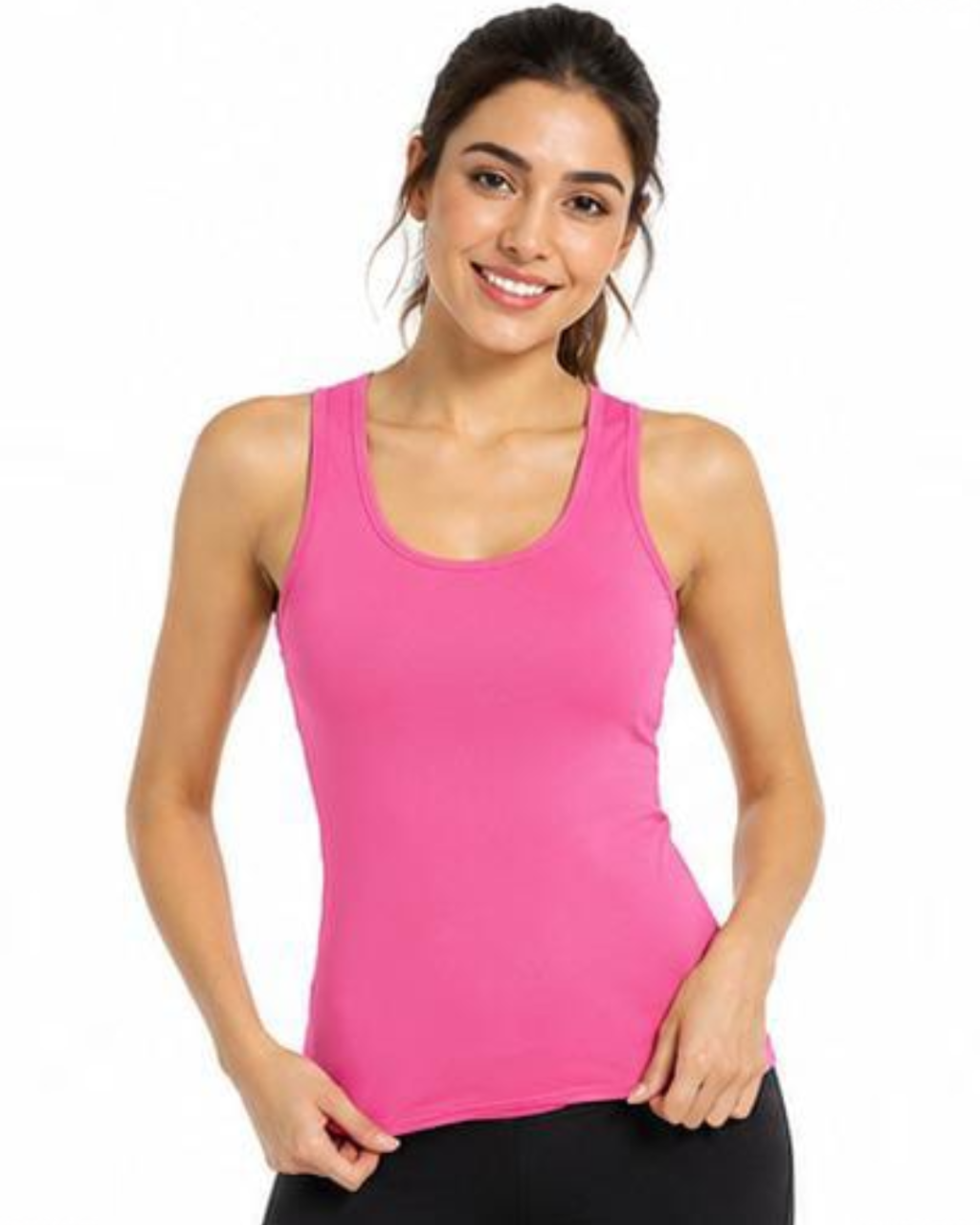 A woman modeling a bright pink racerback tank top against a plain white background.