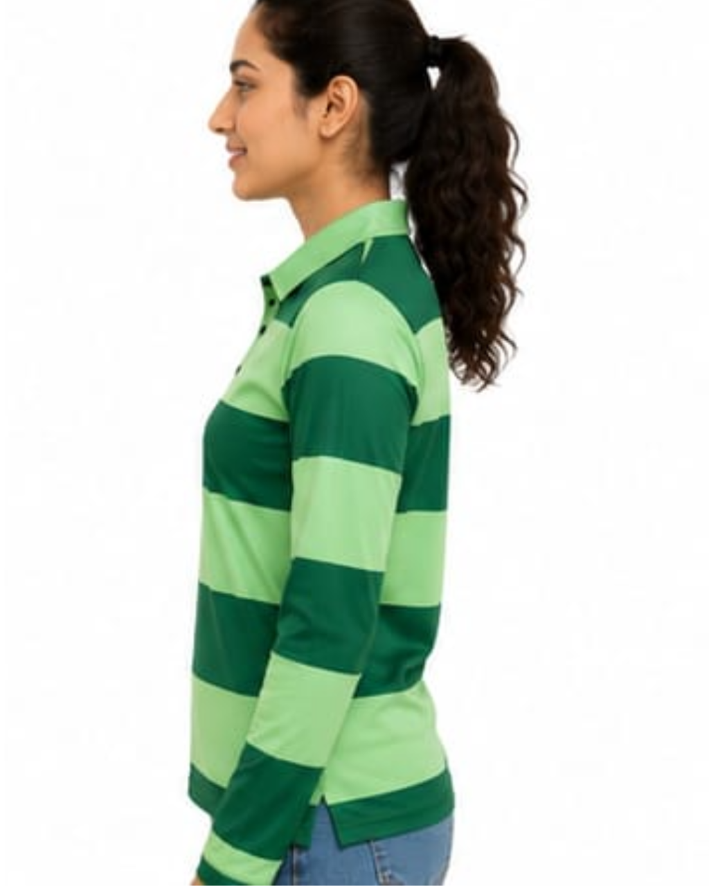 A woman shown in side profile wearing a green and light green horizontally striped long-sleeve collared shirt, paired with blue jeans, against a plain white background.