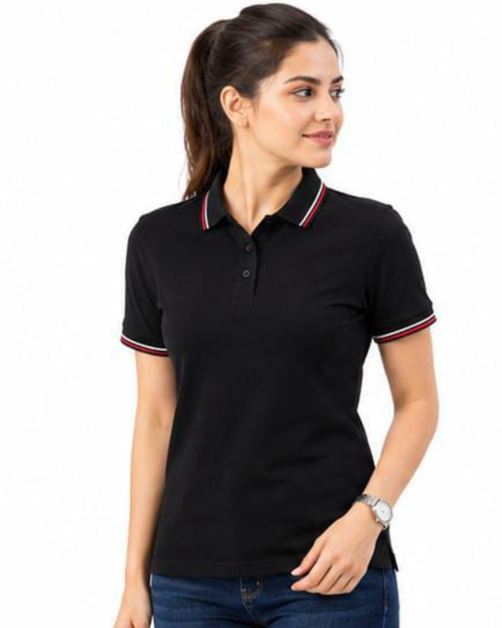 A woman wearing a black short-sleeve polo shirt with red and white striped trim on the collar and sleeve cuffs, paired with blue jeans, against a plain white background.