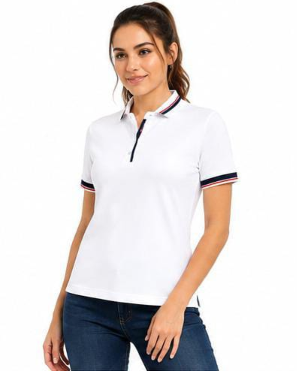 A woman modeling a white short-sleeve polo shirt with navy and red striped trim on the collar and sleeve cuffs, paired with dark blue jeans against a plain white background.