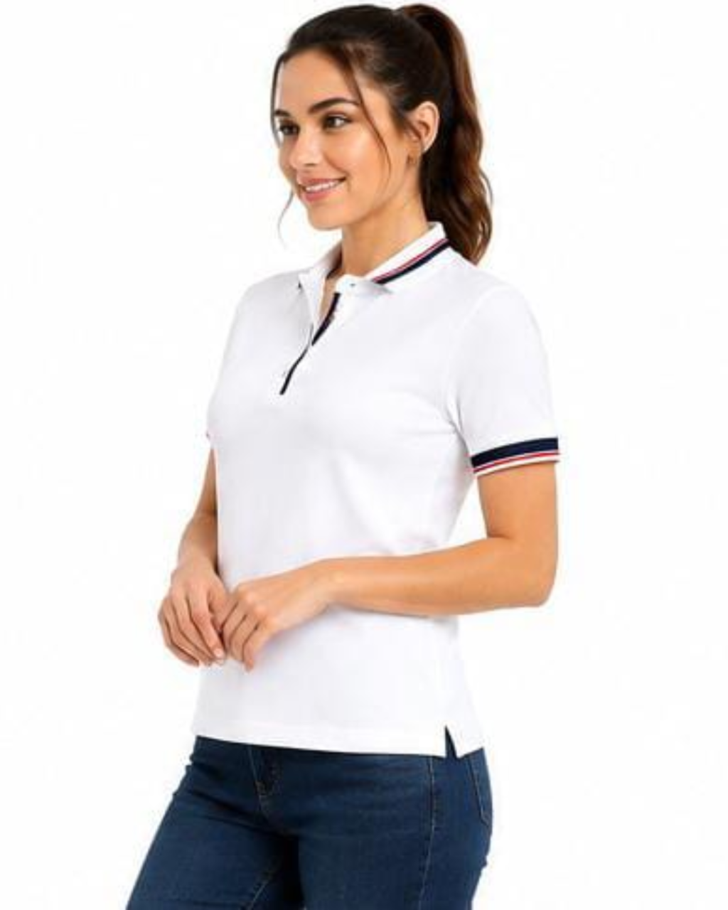 A woman wearing a white short-sleeve polo shirt with navy and red striped trim on the collar and sleeve cuffs, paired with dark blue jeans, against a plain white background.