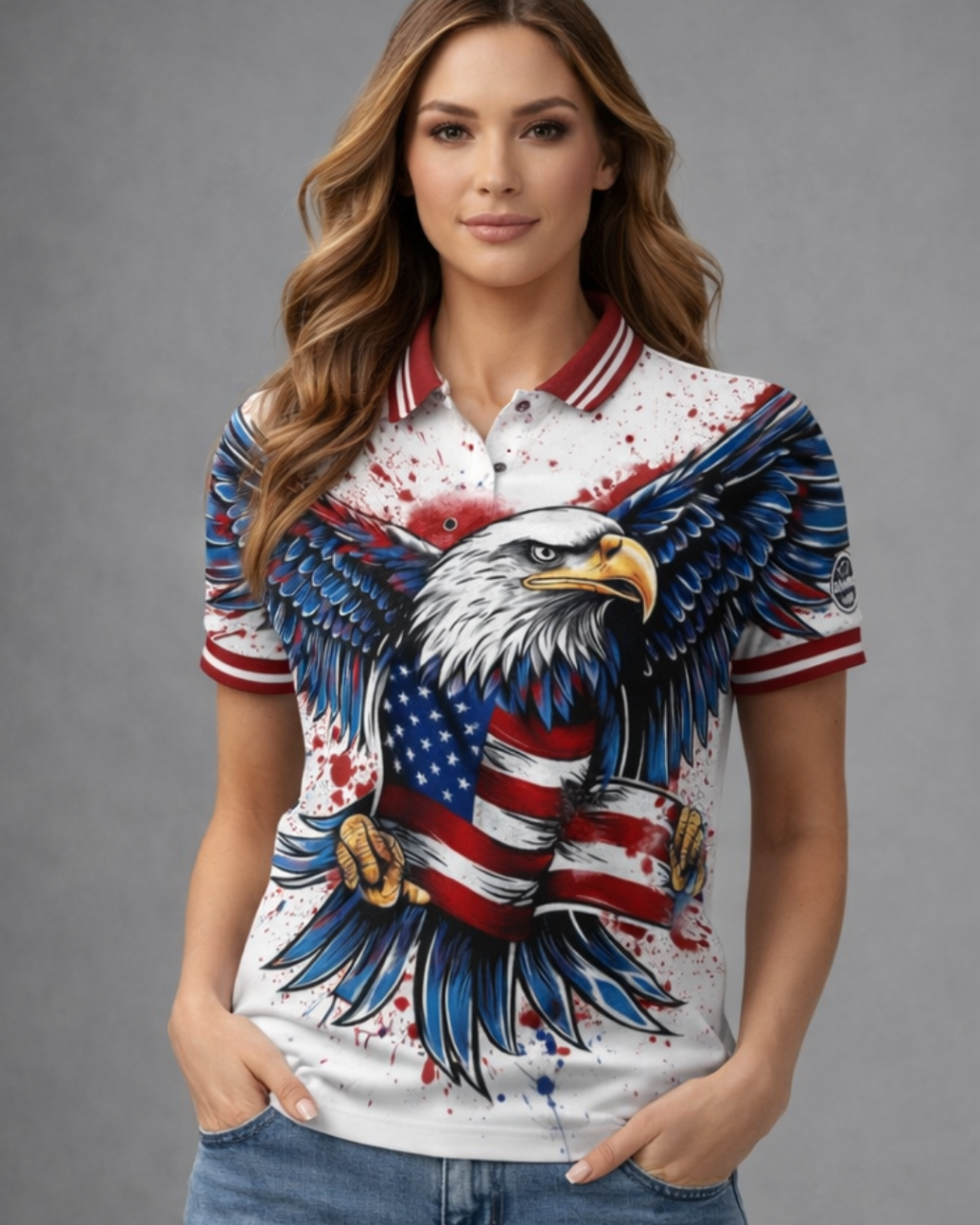 Woman wearing a polo shirt with an eagle and American flag design on a gray background
