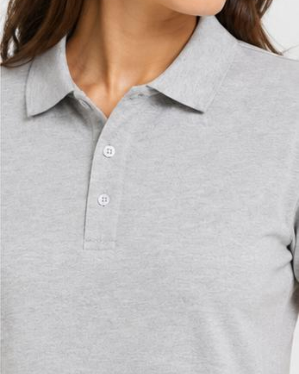 Close-up of a light heather gray polo shirt worn by a model, showing the collar, button placket, and upper chest.