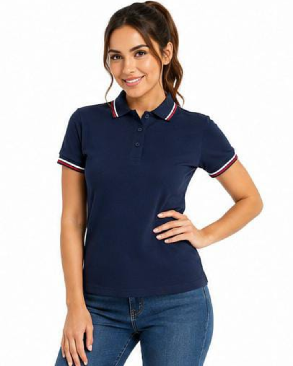 A woman modeling a navy blue short-sleeve polo shirt with white and red striped trim on the collar and sleeve cuffs, paired with blue jeans against a plain white background.