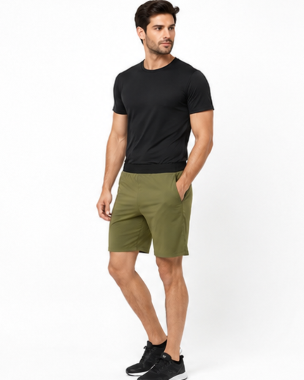 A man modeling a black short-sleeve crewneck t-shirt and olive green athletic shorts against a plain white studio background.