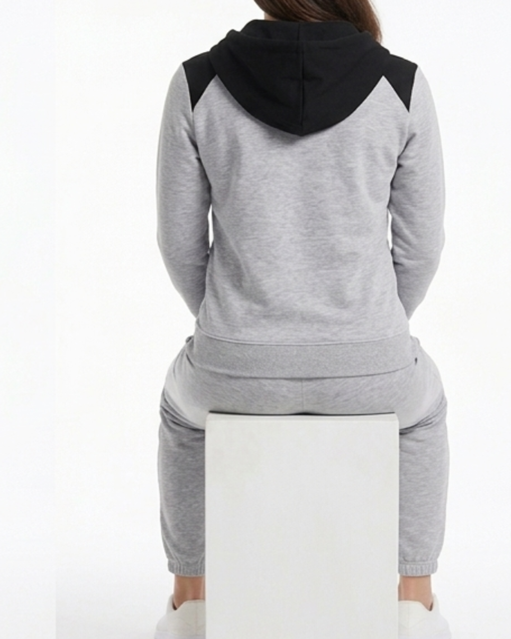 Gray hoodie with black hood on a white background