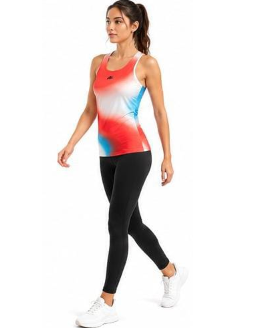 A woman modeling a sleeveless athletic tank top with a red, white, and blue gradient design, paired with black leggings and white sneakers, set against a plain white background.