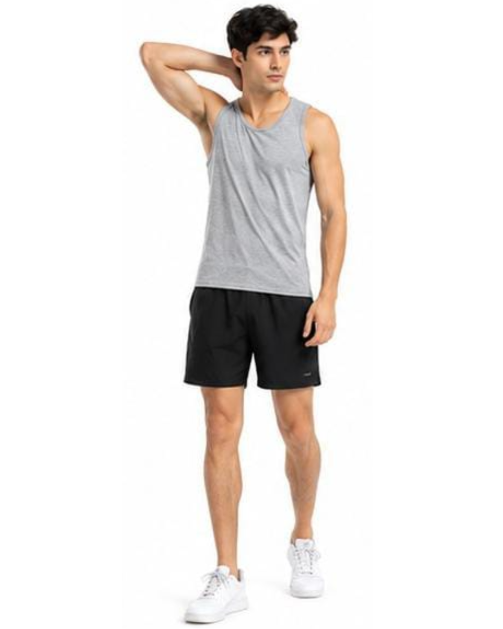 A man modeling a light gray sleeveless athletic tank top and black athletic shorts against a plain white background.