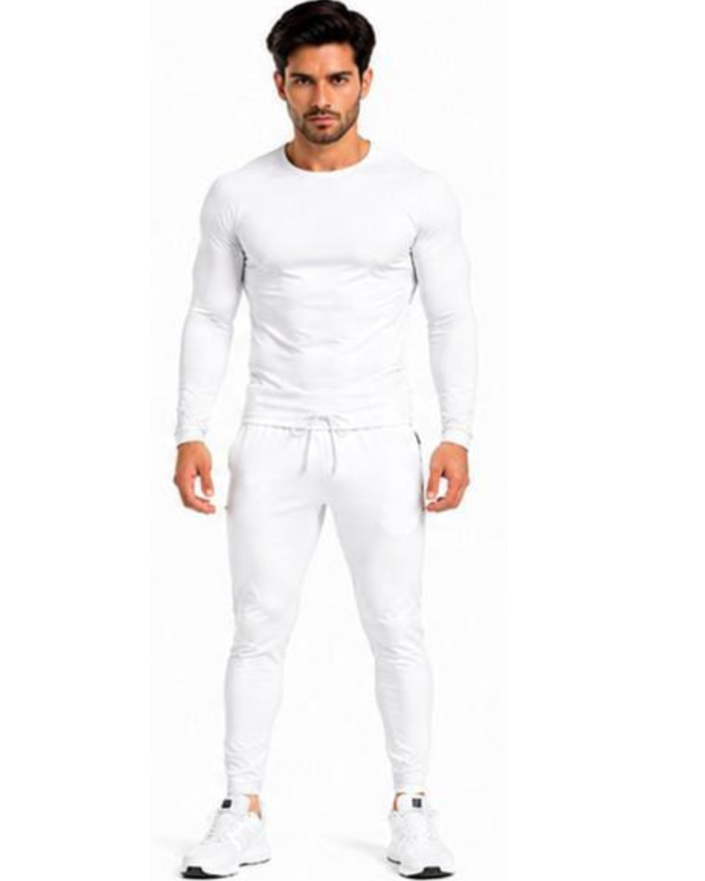 A man modeling a matching white long-sleeve athletic top and jogger pants set against a plain white background.