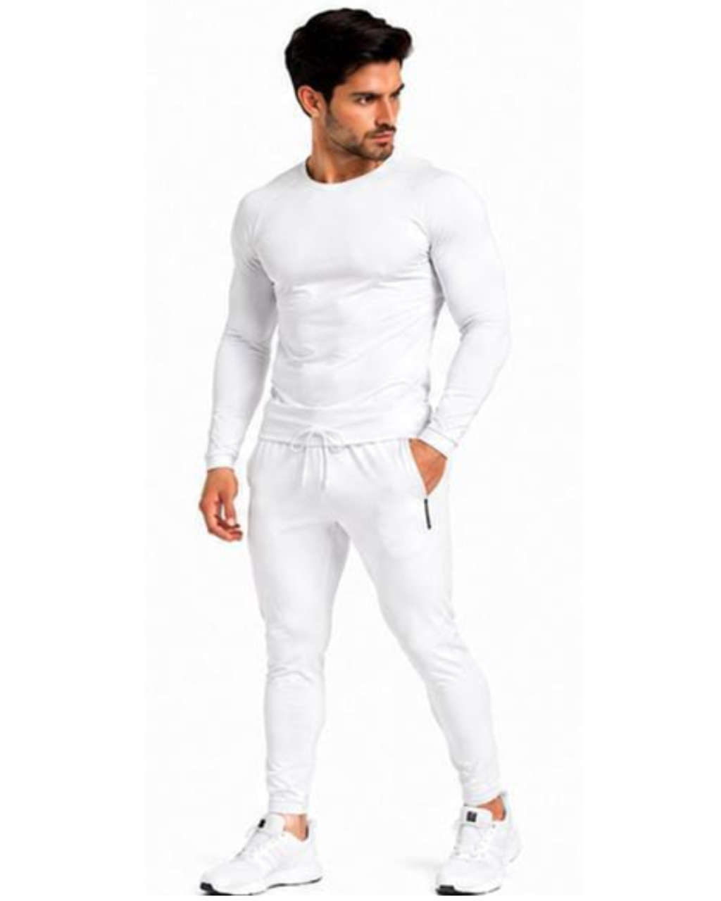 A man modeling a white long-sleeve athletic shirt and matching white jogger pants against a plain white background.