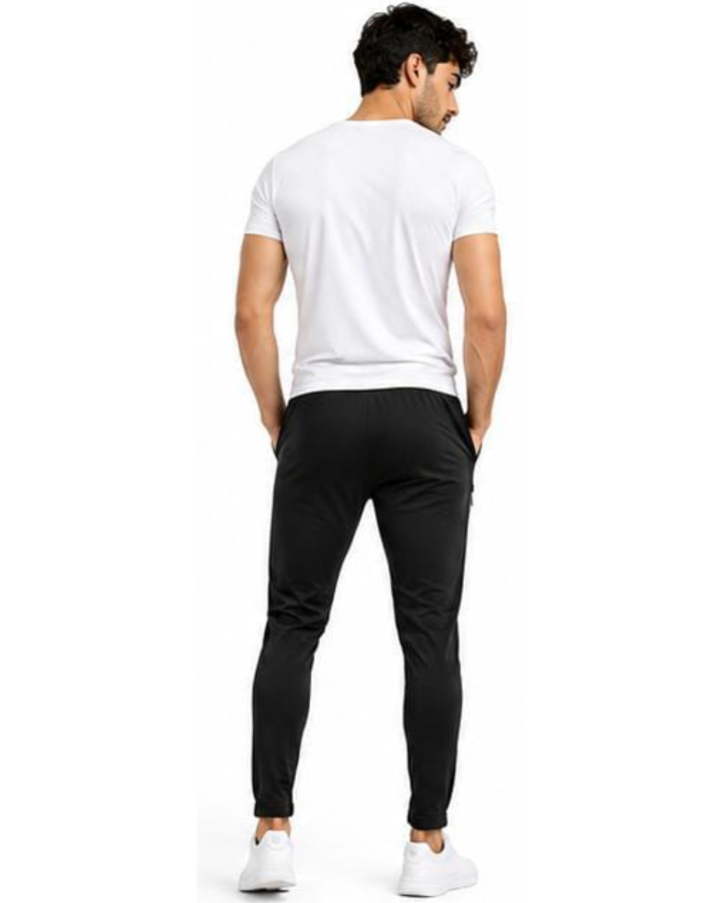 A man shown from the back wearing a white t-shirt, black jogger pants, and white sneakers against a plain white background.