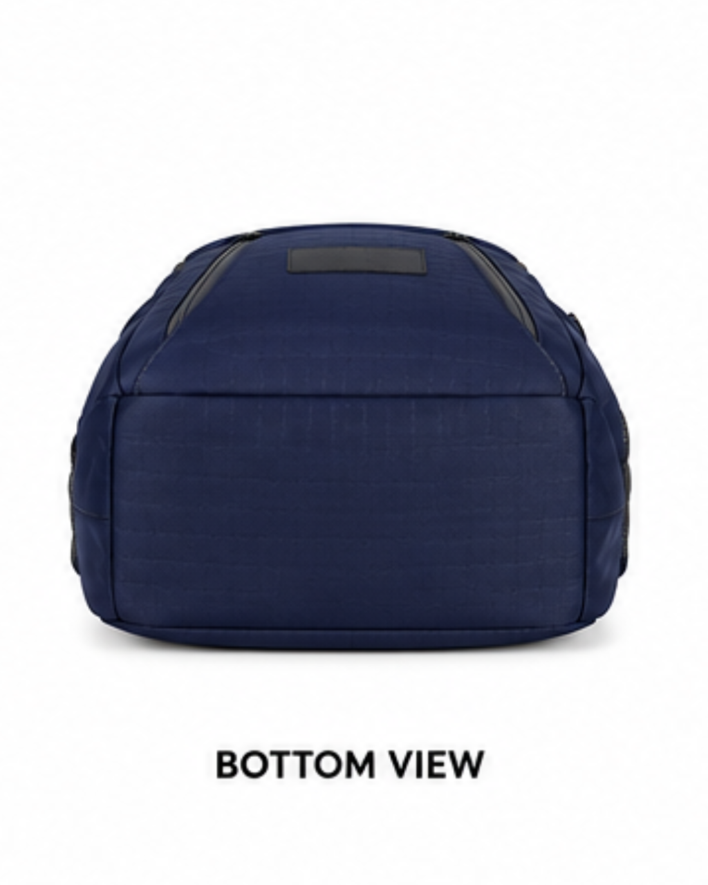 A navy blue backpack shown from the bottom view, displaying its curved bottom edge and a small dark rectangular patch on the top, set against a plain white background with 'BOTTOM VIEW' text below.