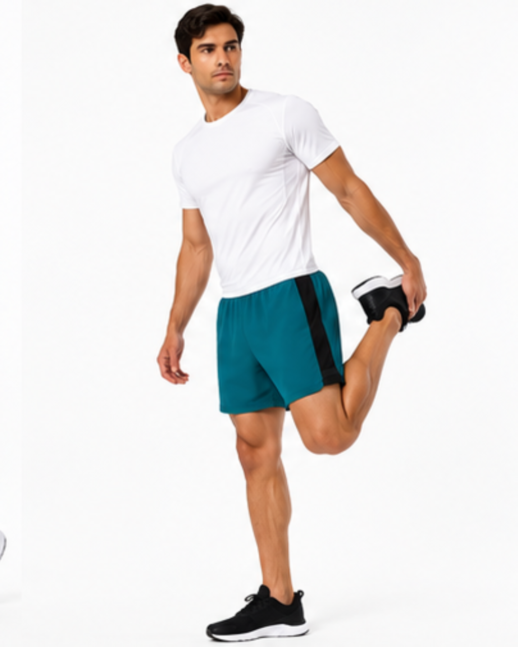 A man in a white t-shirt and teal athletic shorts with a black side stripe is stretching his leg against a plain white background.