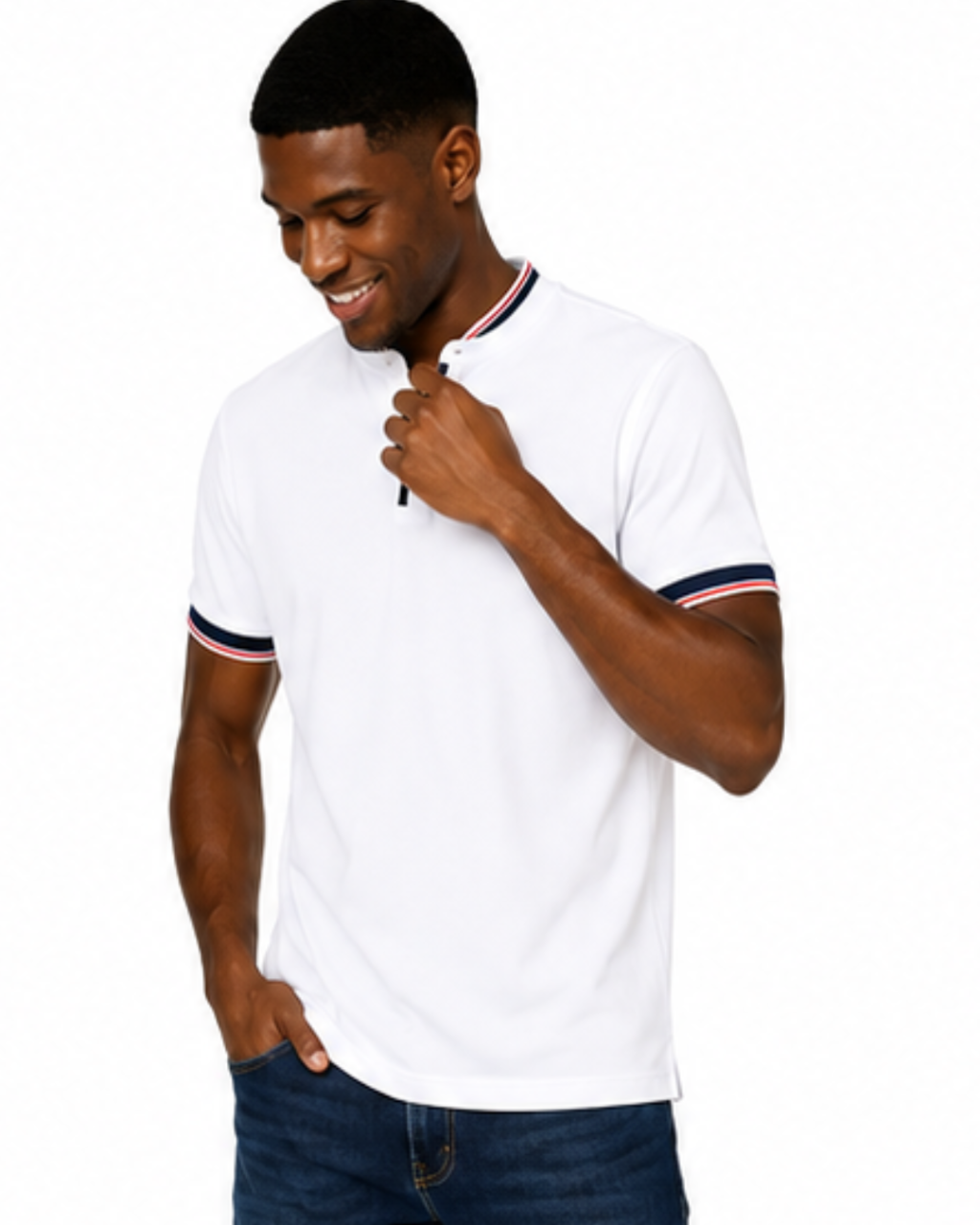A man wearing a white short-sleeve polo shirt with navy and red striped ribbed trim on the collar and sleeve cuffs, paired with dark blue jeans, against a plain white background.